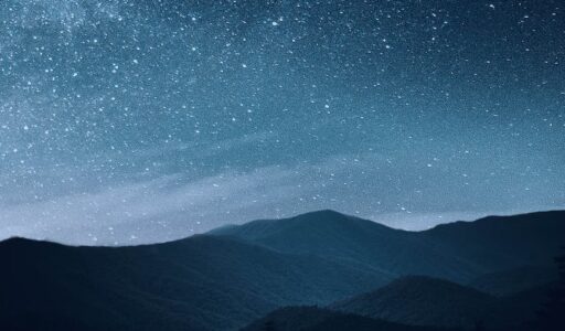 starry sky over mountains